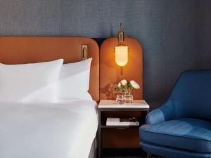 Postel nebo postele na pokoji v ubytování Hyatt Regency London Stratford