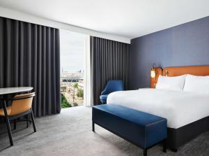 Postel nebo postele na pokoji v ubytování Hyatt Regency London Stratford