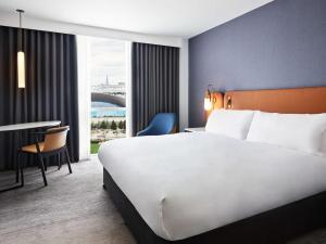 Postel nebo postele na pokoji v ubytování Hyatt Regency London Stratford