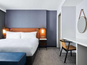 Postel nebo postele na pokoji v ubytování Hyatt Regency London Stratford