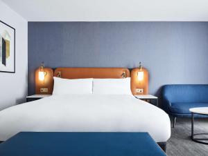 Postel nebo postele na pokoji v ubytování Hyatt Regency London Stratford