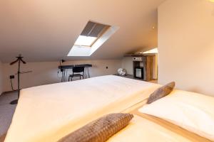 Posteľ alebo postele v izbe v ubytovaní Padre Boutique Hotel