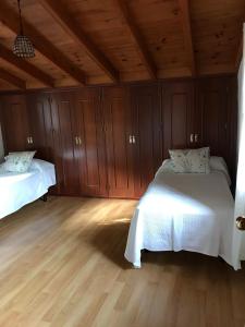 Кровать или кровати в номере Las Mariquitas
