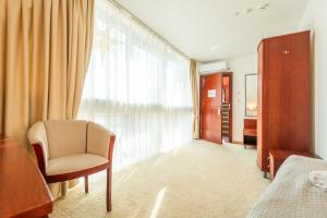 Postel nebo postele na pokoji v ubytování Hotel Medūna