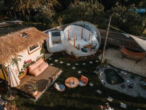 an aerial view of a backyard with a tent at Alpacosi Oase - Schlafen unter den Sternen in Zehdenick