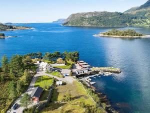 an aerial view of a house on an island in a body of water at 3 person holiday home in Flatraket-By Traum in Barmen