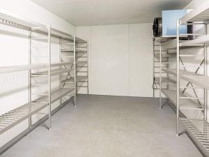 a room with empty shelves in a room at 3 person holiday home in Flatraket-By Traum in Barmen
