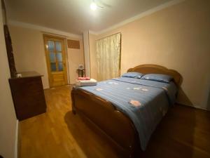 En eller flere senger på et rom på Overnight Stay House in Tbilisi