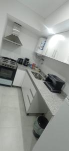A kitchen or kitchenette at El Descanso