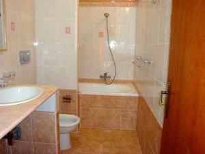 a bathroom with a shower and a toilet and a sink at Alba Pura in Santa Caterina Dello Ionio Marina
