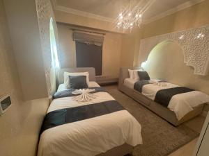 Postel nebo postele na pokoji v ubytování ROYAL BEACH RESIDENCES 2 + 37 fotografií
