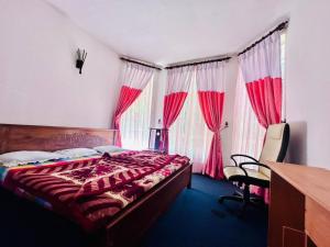 a bedroom with a bed and two windows with red curtains at Lakeside Cottage by Clover in Nuwara Eliya