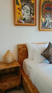 Postel nebo postele na pokoji v ubytování Uma Rimbun Pool Villa by Uniquecations