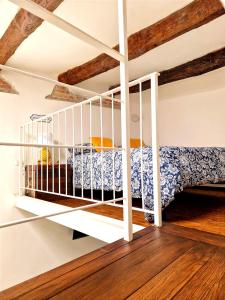 a bedroom with a bunk bed in a room at Casa con terrazza esclusiva vicino al mare Domus Neapolis Happy Holiday in Naples