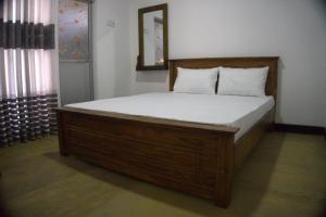 מיטה או מיטות בחדר ב-Golden holiday home