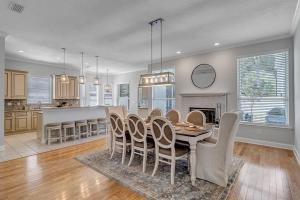 a kitchen and dining room with a table and chairs at Stunning Ocean Villa-Luxurious Ponte Vedra Living in Jacksonville Beach