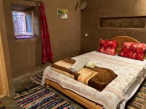 Katil atau katil-katil dalam bilik di Authentic riad & activities Erg