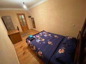 Een bed of bedden in een kamer bij Overnight Stay House in Tbilisi