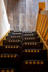 a set of stairs with chinese writing on them at Captains Lookout (Studio apartment) in Brecon
