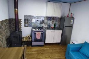 Η κουζίνα ή μικρή κουζίνα στο Cabañas mateo 03 nuevo +3 φωτογραφίες