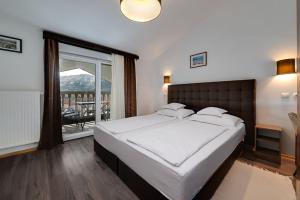 Ένα ή περισσότερα κρεβάτια σε δωμάτιο στο Bed & Breakfast Došen III +37 φωτογραφίες