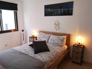 Posteľ alebo postele v izbe v ubytovaní BKD1 - Apartamento entero a 50 metros PLAYA DE LAS CANTERAS
