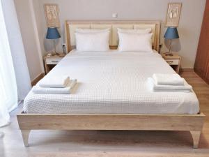 Krevet ili kreveti u jedinici u okviru objekta City Center Apartment with a Modern Breeze