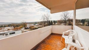 Balkón nebo terasa v ubytování Monteurwohnung mit Balkon und Wohnzimmer