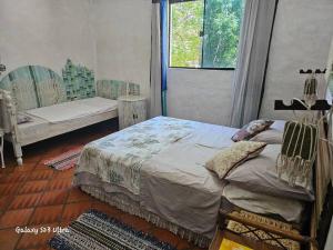 Postel nebo postele na pokoji v ubytování Espacios amplios con terraza y piscina spa