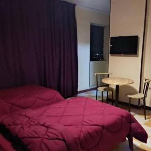 Letto o letti in una camera di Al Waha Hostel