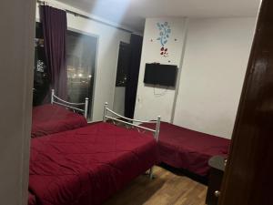 Letto o letti in una camera di Al Waha Hostel