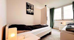 Posezení v ubytování Monteurwohnung mit Balkon und Wohnzimmer