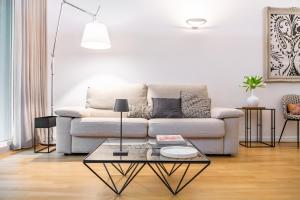 Posezení v ubytování Appartamento Peschiera Borromeo - Linate + 13 fotografií