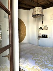 Posteľ alebo postele v izbe v ubytovaní Apartamento La Galería de Ronda
