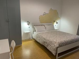A bed or beds in a room at Regina Elena al mare
