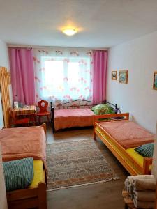 Postel nebo postele na pokoji v ubytování Hotel Zemlinski