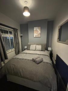 Katil atau katil-katil dalam bilik di Manor House