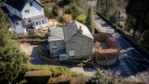 an aerial view of a large house with a street at Dene Croft Cottage in Hexham