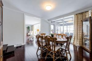 a dining room with a table and chairs at The Bruce Trail Retreat in St. Catharines