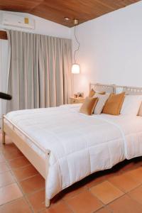 RN Villa - San Benito客房内的一张或多张床位