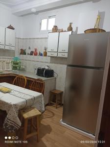 Una cocina o zona de cocina en Résidence henni appartement "le palmier"