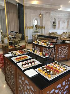 a buffet line with many different types of desserts at Dream's Hotel in Tétouan