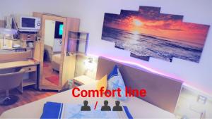TV a/nebo společenská místnost v ubytování Hotel Garni Rodenbach