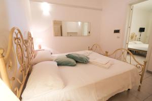 Ένα ή περισσότερα κρεβάτια σε δωμάτιο στο Casa Cabernet Residence Torre Santo Stefano in Otranto