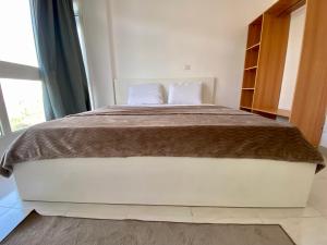 Ένα ή περισσότερα κρεβάτια σε δωμάτιο στο Apartment for Rent in Madinaty