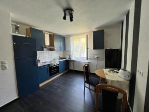Η κουζίνα ή μικρή κουζίνα στο Jennis Bi-Bi 2 bedrooms Apartment