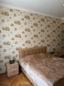 Postel nebo postele na pokoji v ubytování guest house TMT