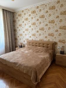 Postel nebo postele na pokoji v ubytování guest house TMT
