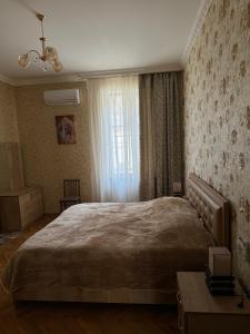 Postel nebo postele na pokoji v ubytování guest house TMT