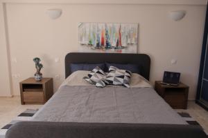 Postel nebo postele na pokoji v ubytování Studio on the beach